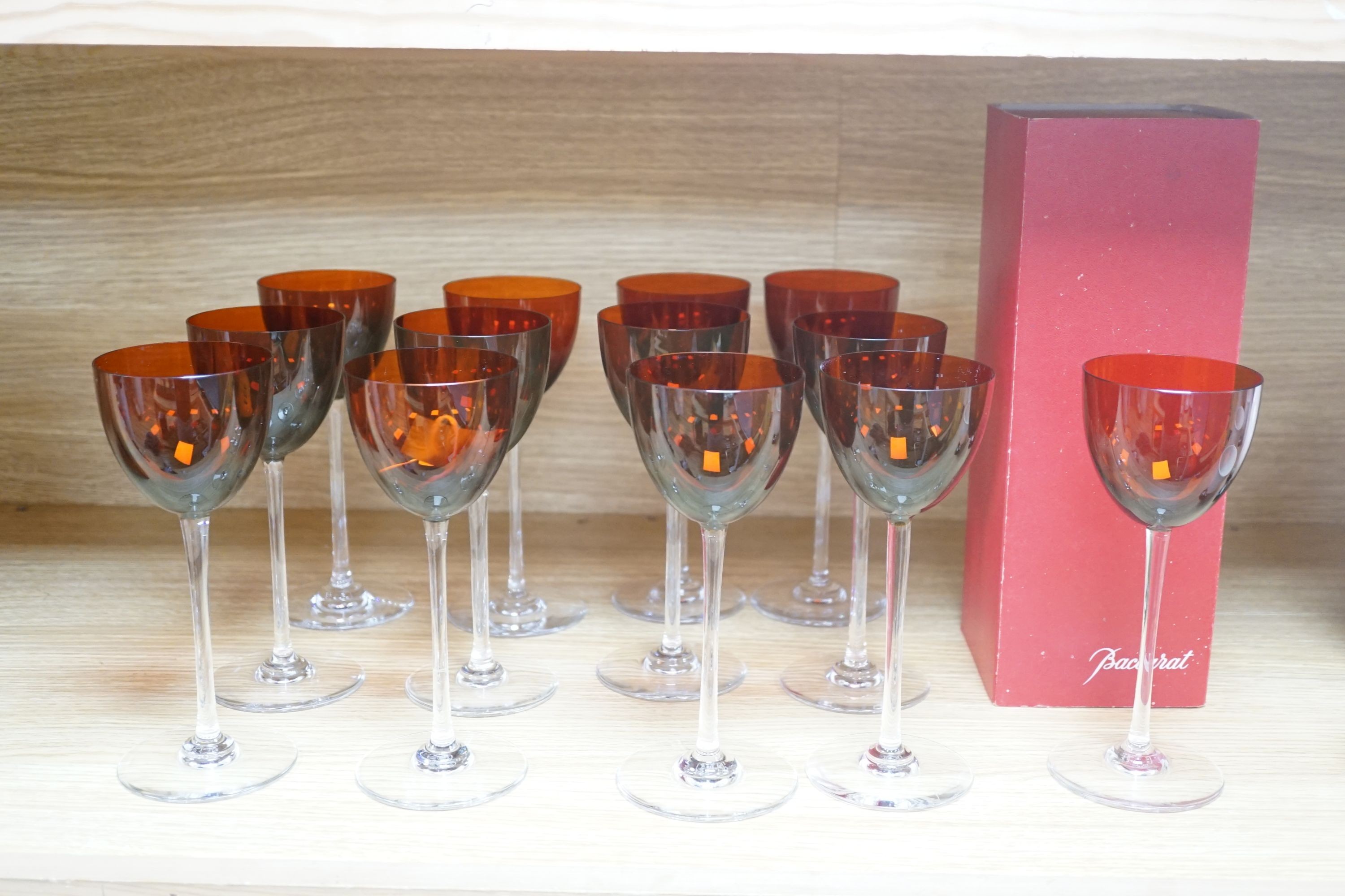 Suite of 14 Baccarat Rhine wine amber glasses, one boxed.